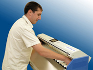 Effective and Cost-Efficient Scanning of Transparent Large Format Documents